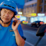Chinese gig worker wins top literary prize. He writes on struggles of delivery riders