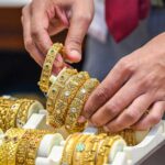 Gold, silver slip as dollar strengthens on firm US jobs data