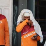 Incentives, penalties, pay loss keep delivery workers on the job through hot days