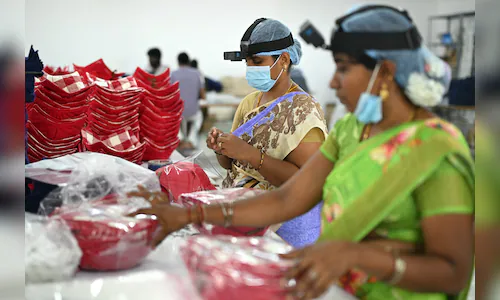 The Indian workers training AI robots to take their jobs