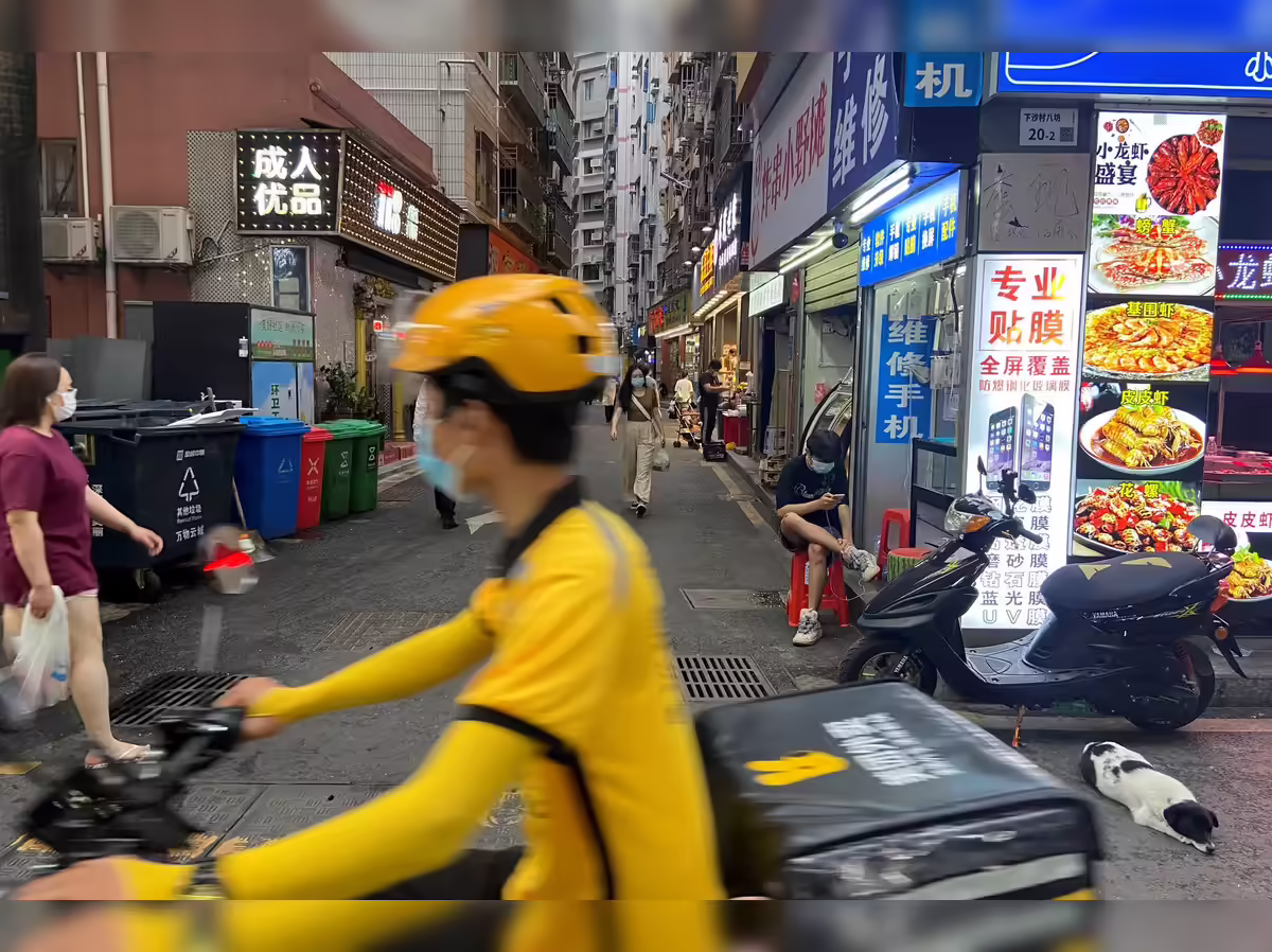 china gig economy: China's booming gig economy masks job market pain, strains welfare system