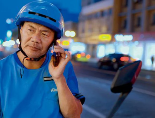 Chinese gig worker wins top literary prize. He writes on struggles of delivery riders