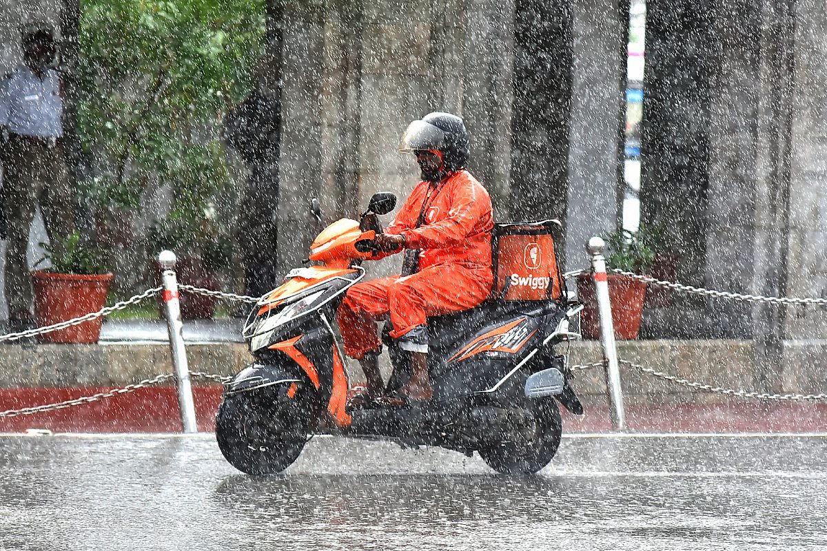 For Delhi's delivery riders, every downpour means more orders, more income and more danger