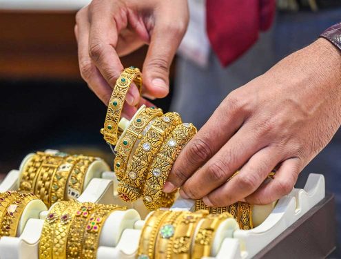 Gold, silver slip as dollar strengthens on firm US jobs data